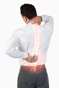 Digital-composite-of-Highlighted-spine-of-man-with-back-pain