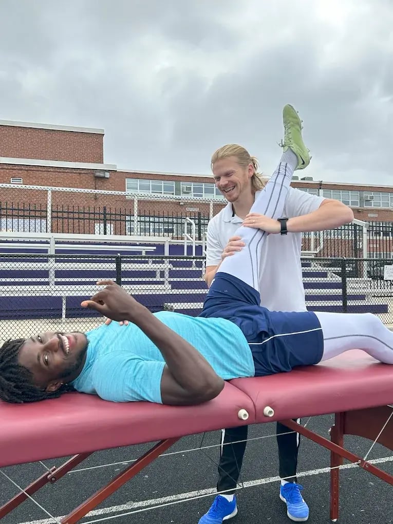 Photo of Glackin Physiotherapy performing physical therapy on a soccer athlete